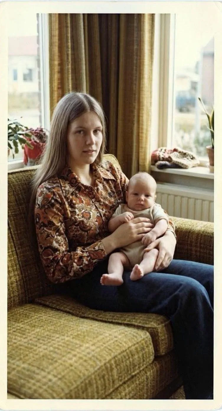 The same photo of the mother and baby restored